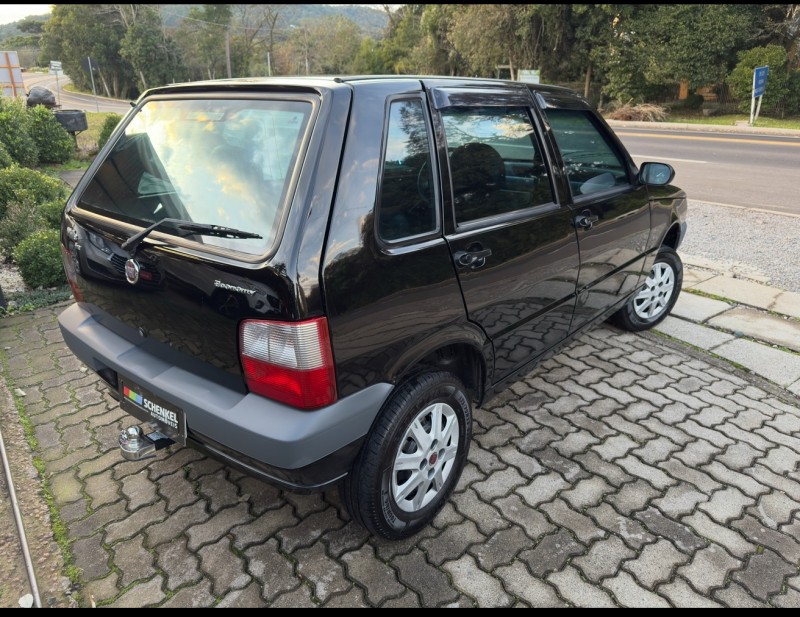 UNO 1.0 MPI MILLE FIRE ECONOMY 8V FLEX 4P MANUAL - 2009 - NOVA PETRóPOLIS