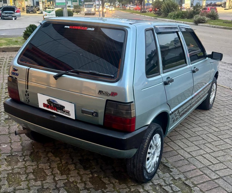 UNO 1.0 IE MILLE EP 8V GASOLINA 4P MANUAL - 1996 - CAXIAS DO SUL