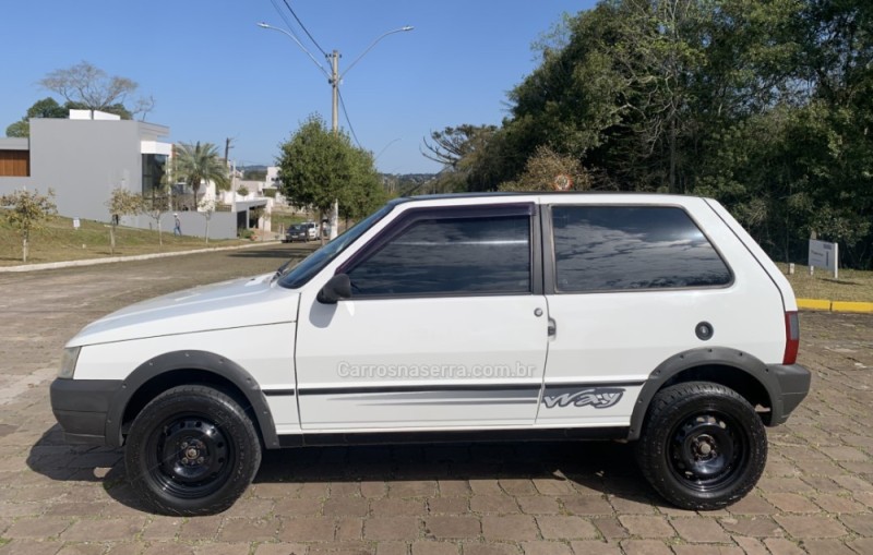 UNO 1.0 MPI MILLE WAY ECONOMY 8V FLEX 2P MANUAL - 2011 - GUAPORé