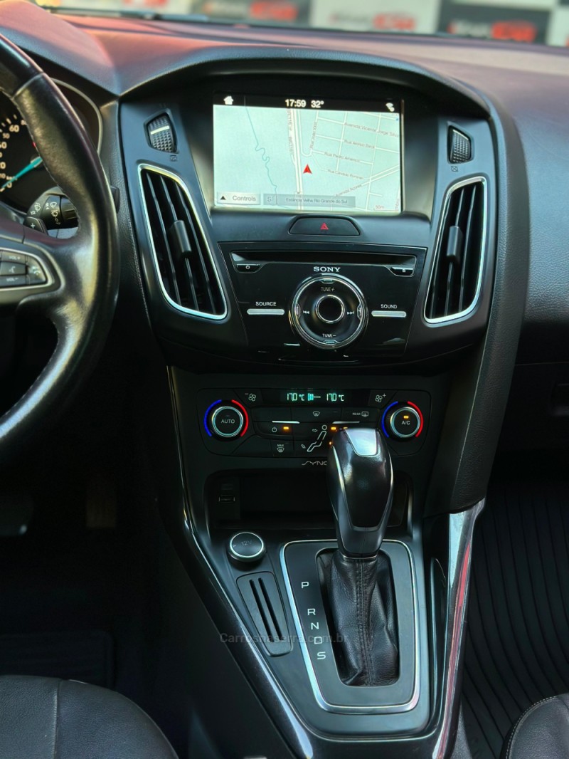 FOCUS 2.0 TITANIUM PLUS FASTBACK 16V FLEX 4P AUTOMÁTICO - 2017 - ESTâNCIA VELHA
