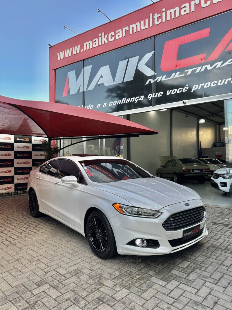 FUSION 2.0 TITANIUM FWD 16V GASOLINA 4P AUTOMÁTICO - 2014 - ESTâNCIA VELHA