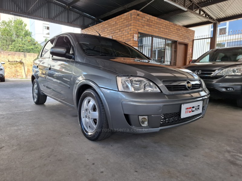 corsa 1.4 mpfi premium sedan 8v flex 4p manual 2012 garibaldi