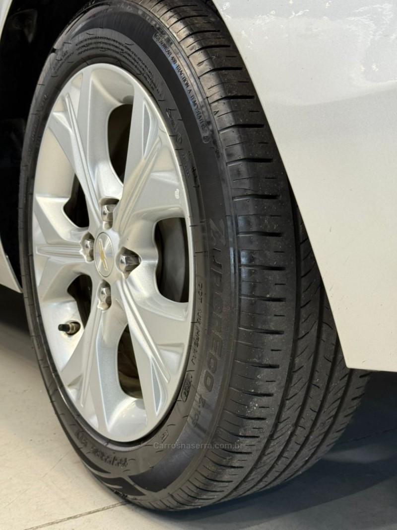 ONIX 1.0	PREMIER PLUS 12V TURBO FLEX 4P AUTOMÁTICO - 2020 - CAXIAS DO SUL
