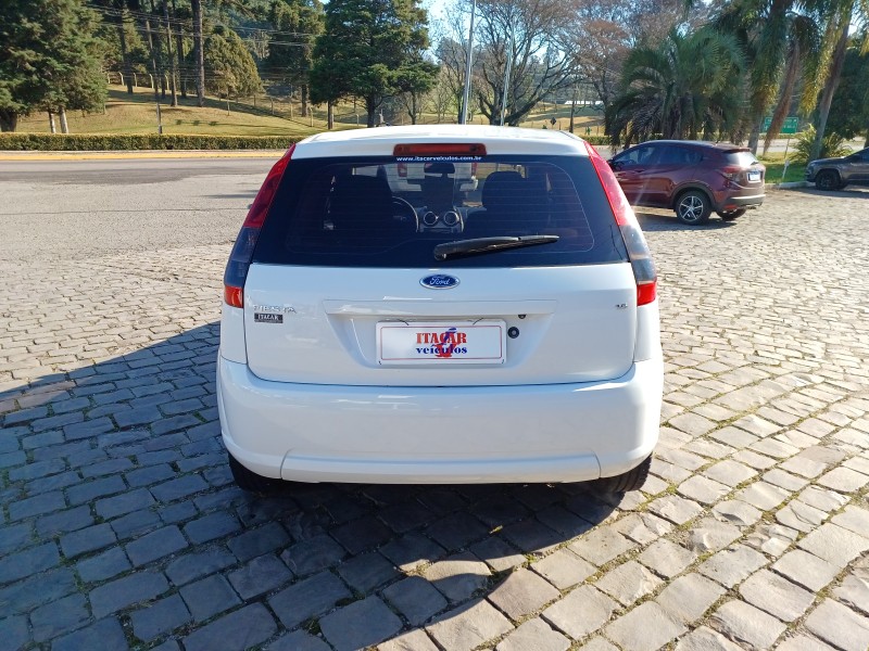 FIESTA 1.6 MPI HATCH 8V FLEX 4P MANUAL - 2014 - FLORES DA CUNHA