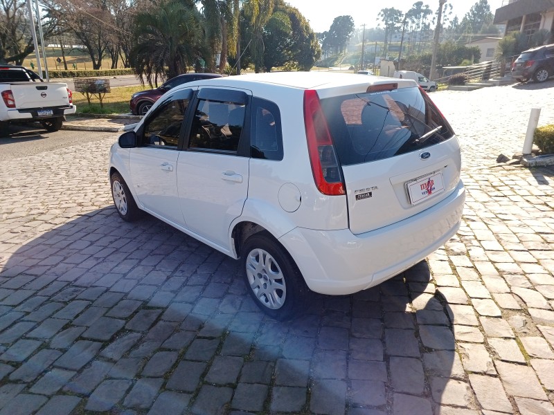 FIESTA 1.6 MPI HATCH 8V FLEX 4P MANUAL - 2014 - FLORES DA CUNHA