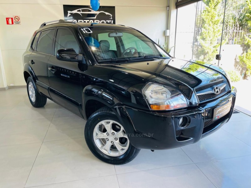 tucson 2.0 mpfi gls 16v 143cv 2wd gasolina 4p automatico 2010 caxias do sul