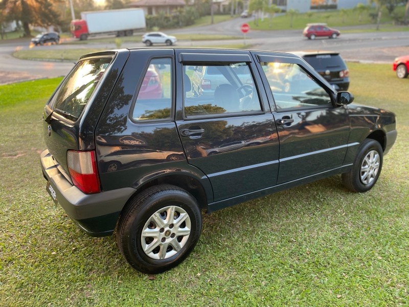 UNO 1.0 MPI MILLE FIRE ECONOMY 8V FLEX 4P MANUAL - 2010 - BOM PRINCíPIO