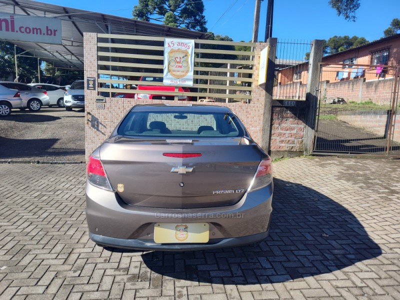 PRISMA 1.4 MPFI LTZ 8V FLEX 4P MANUAL - 2014 - CANELA