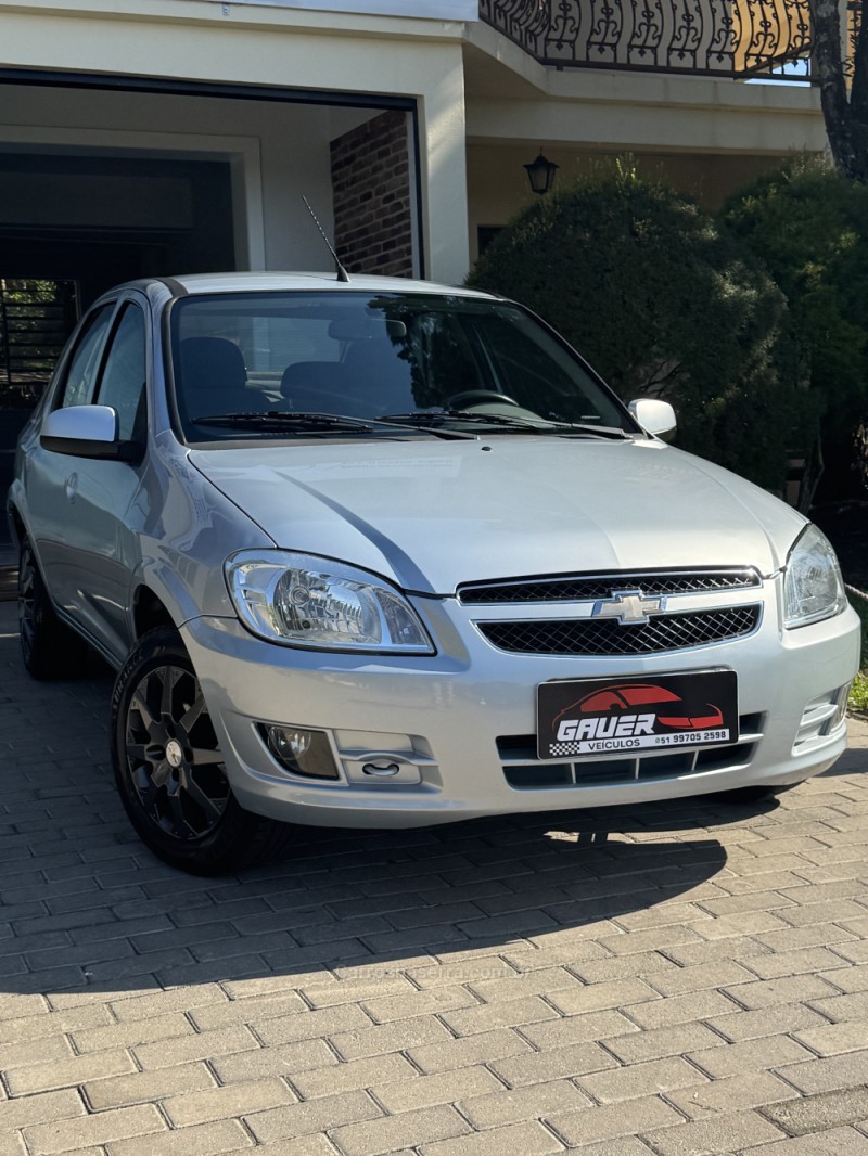 PRISMA 1.0 MPFI LT 8V FLEX 4P MANUAL - 2012 - ENCANTADO