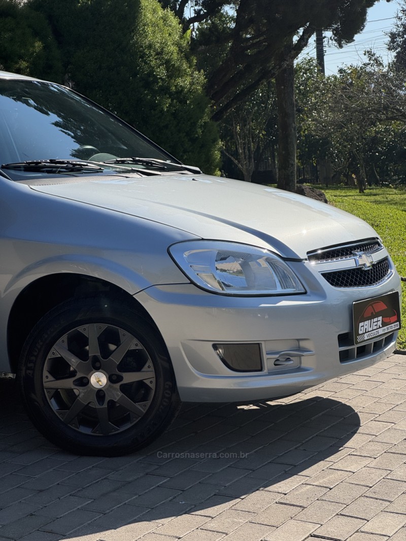 PRISMA 1.0 MPFI LT 8V FLEX 4P MANUAL - 2012 - ENCANTADO