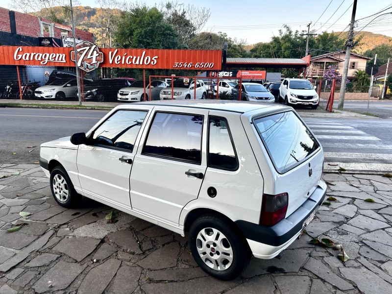 UNO 1.0 MPI MILLE FIRE ECONOMY 8V FLEX 4P MANUAL - 2013 - TRêS COROAS