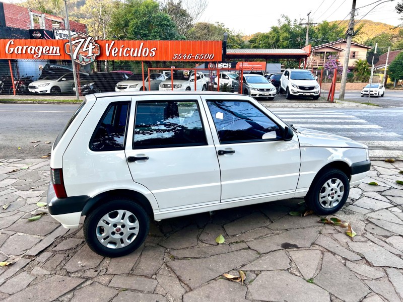 UNO 1.0 MPI MILLE FIRE ECONOMY 8V FLEX 4P MANUAL - 2013 - TRêS COROAS