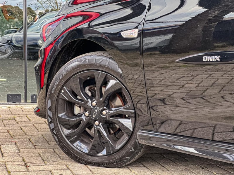 ONIX 1.0 HATCH RS 12V TURBO 4P AUTOMÁTICO - 2024 - CANELA