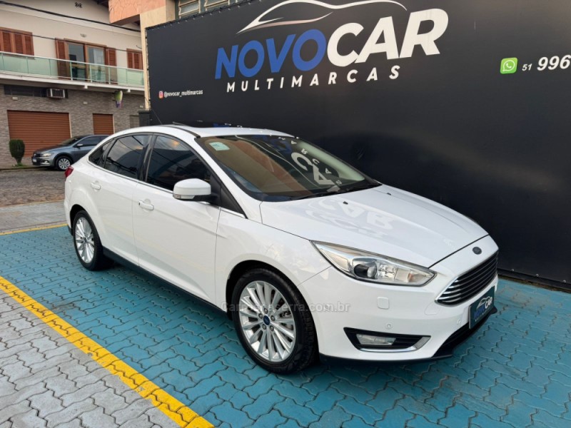 FOCUS 2.0 TITANIUM FASTBACK 16V FLEX 4P AUTOMÁTICO - 2016 - ESTâNCIA VELHA