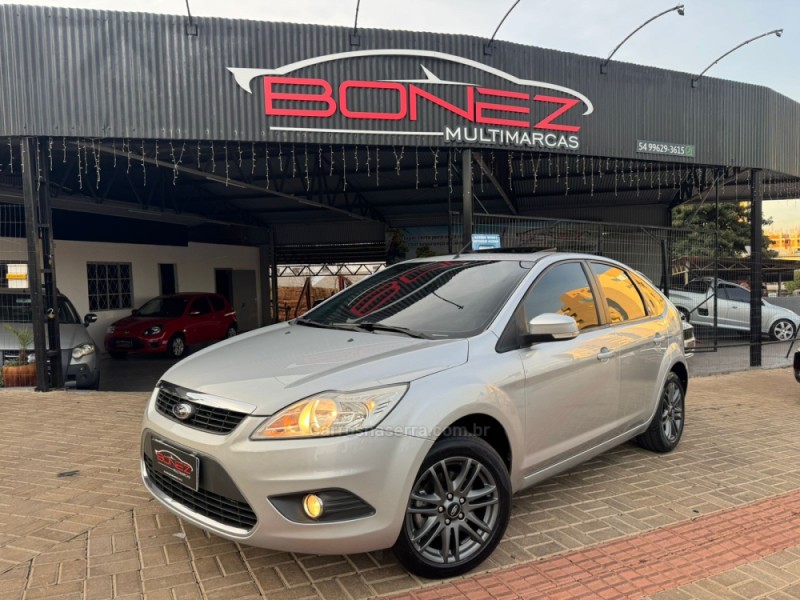 focus 2.0 ghia 16v flex 4p automatico 2009 tapejara