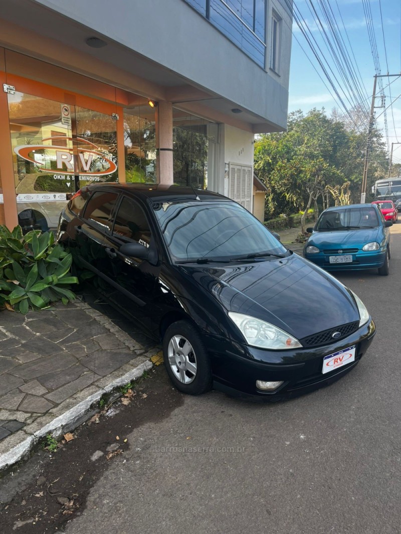 FOCUS 1.6 8V FLEX 4P MANUAL - 2009 - CARLOS BARBOSA