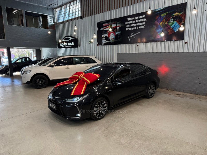 corolla 1.8 altis premium 16v hibrido 4p automatico 2022 caxias do sul
