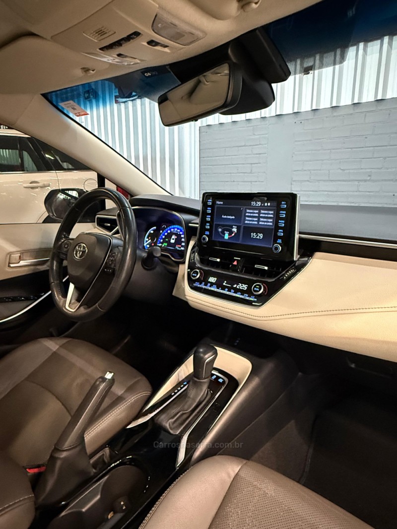 COROLLA 1.8 ALTIS PREMIUM 16V HÍBRIDO 4P AUTOMÁTICO - 2022 - CAXIAS DO SUL