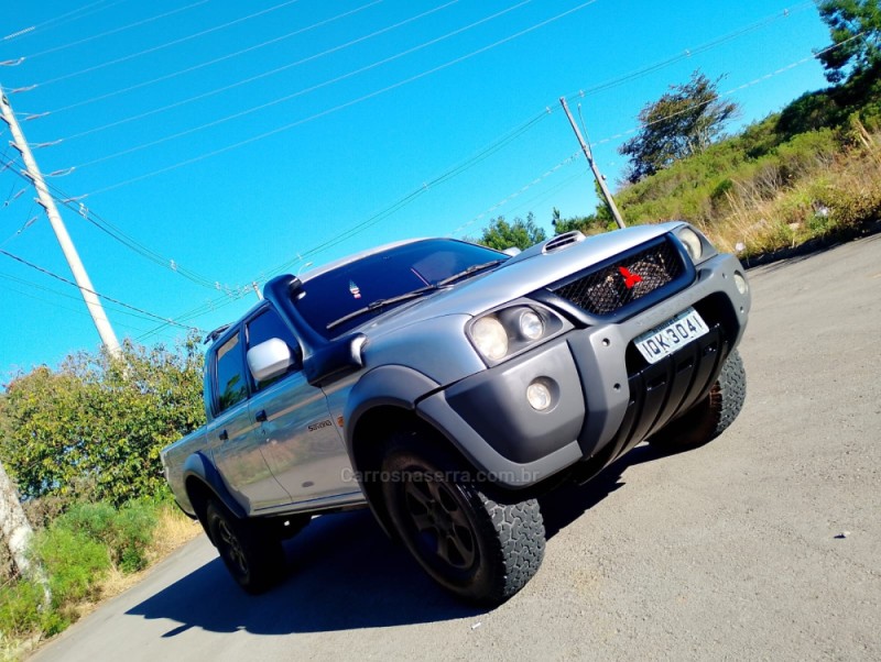 L200 OUTDOOR 2.5 HPE 4X4 CD 8V TURBO INTERCOOLER DIESEL 4P MANUAL - 2010 - CAXIAS DO SUL