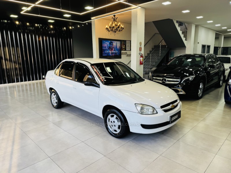 classic 1.0 mpfi 8v gasolina 4p manual 2015 dois irmaos