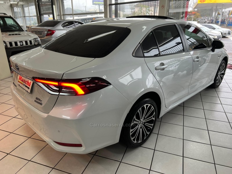 COROLLA 1.8 ALTIS PREMIUM 16V HÍBRIDO 4P AUTOMÁTICO - 2023 - CAXIAS DO SUL