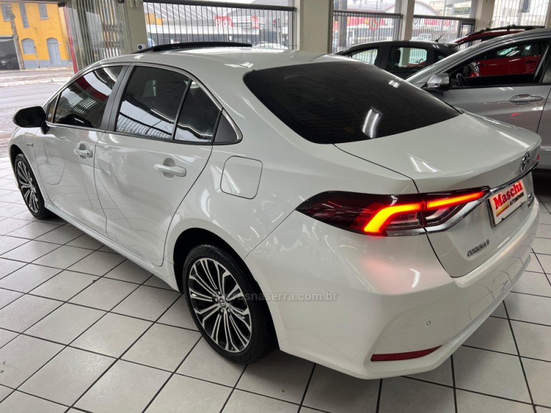 COROLLA 1.8 ALTIS PREMIUM 16V HÍBRIDO 4P AUTOMÁTICO - 2023 - CAXIAS DO SUL