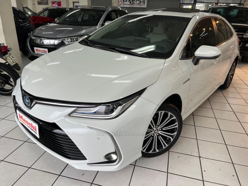 corolla 1.8 altis premium 16v hibrido 4p automatico 2023 caxias do sul