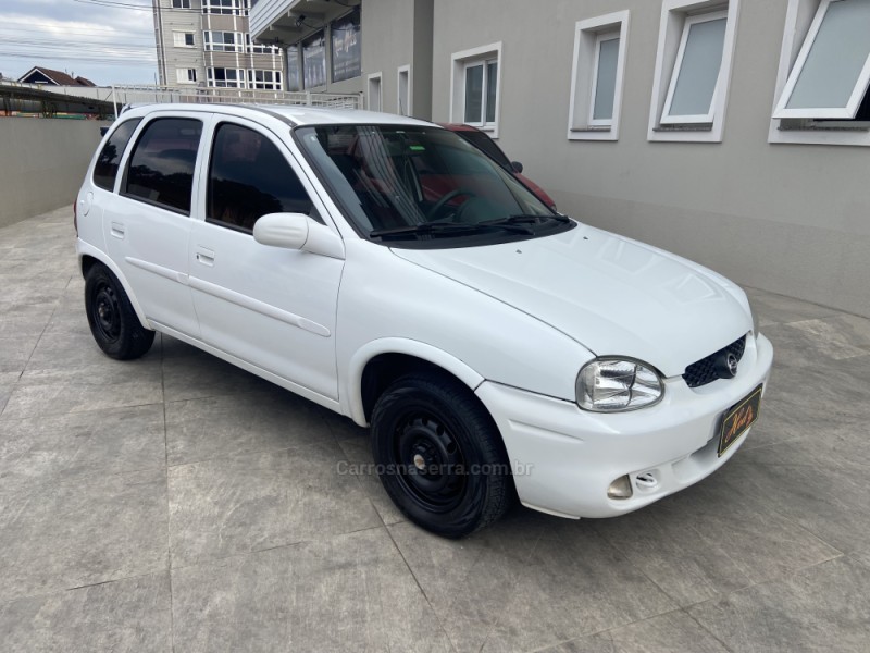 CORSA 1.0 MPFI WIND MILENIUM SEDAN 8V GASOLINA 4P MANUAL - 2002 - CANELA
