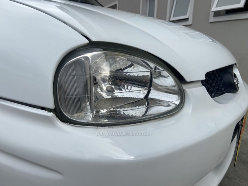 CORSA 1.0 MPFI WIND MILENIUM SEDAN 8V GASOLINA 4P MANUAL - 2002 - CANELA