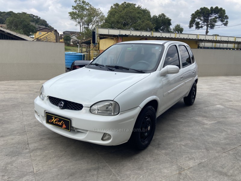 CORSA 1.0 MPFI WIND MILENIUM SEDAN 8V GASOLINA 4P MANUAL - 2002 - CANELA
