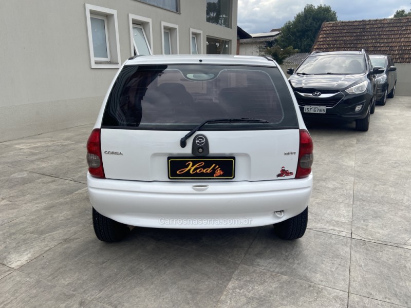 CORSA 1.0 MPFI WIND MILENIUM SEDAN 8V GASOLINA 4P MANUAL - 2002 - CANELA