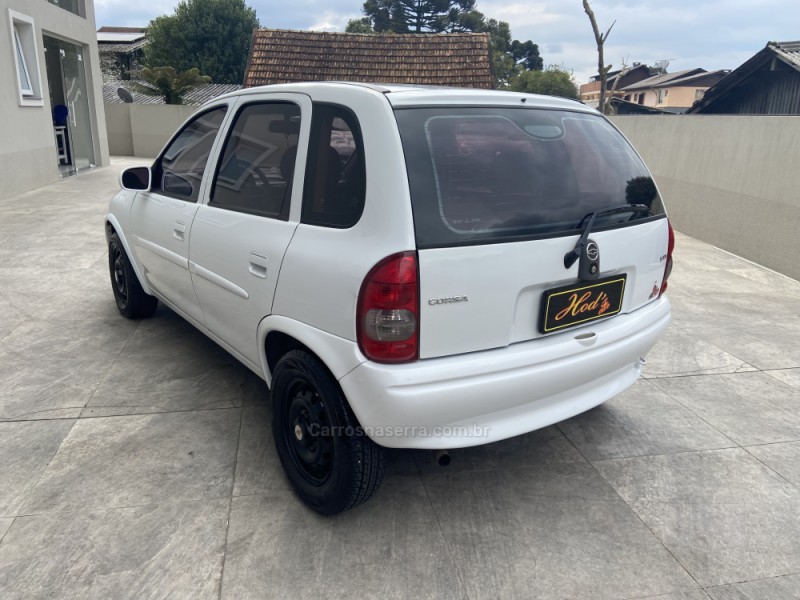 CORSA 1.0 MPFI WIND MILENIUM SEDAN 8V GASOLINA 4P MANUAL - 2002 - CANELA