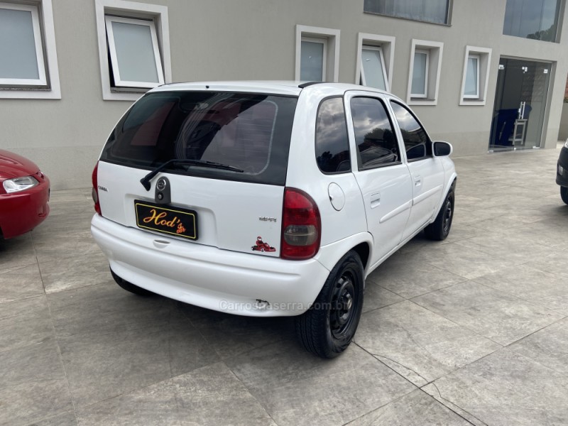 CORSA 1.0 MPFI WIND MILENIUM SEDAN 8V GASOLINA 4P MANUAL - 2002 - CANELA