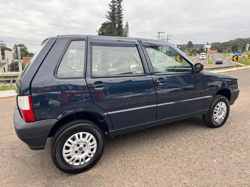 UNO 1.0 MPI MILLE FIRE ECONOMY 8V FLEX 4P MANUAL - 2005 - DOIS IRMãOS