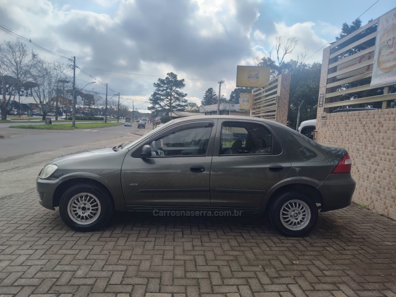 PRISMA 1.4 MPFI JOY 8V FLEX 4P MANUAL - 2010 - CANELA