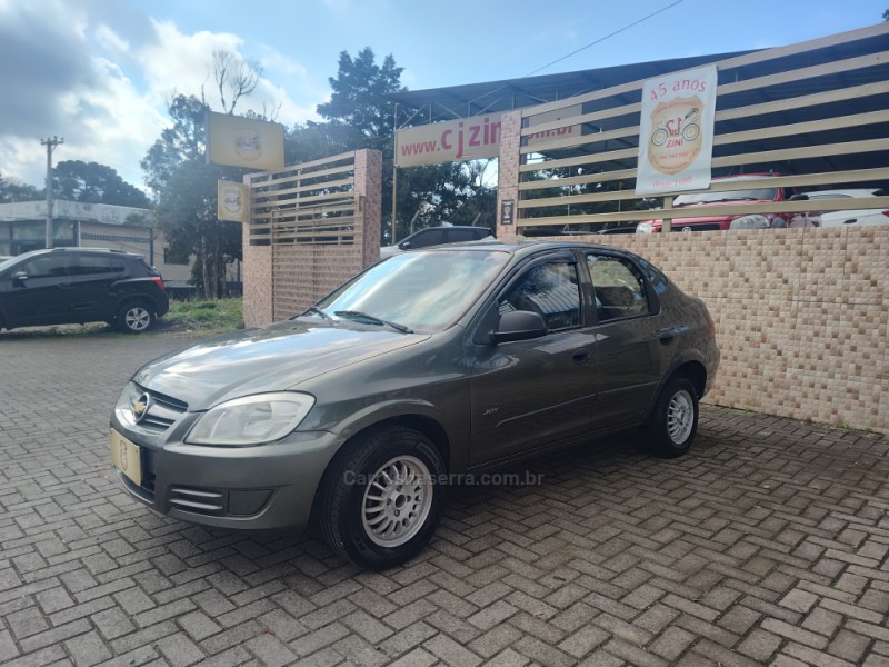 prisma 1.4 mpfi joy 8v flex 4p manual 2010 canela