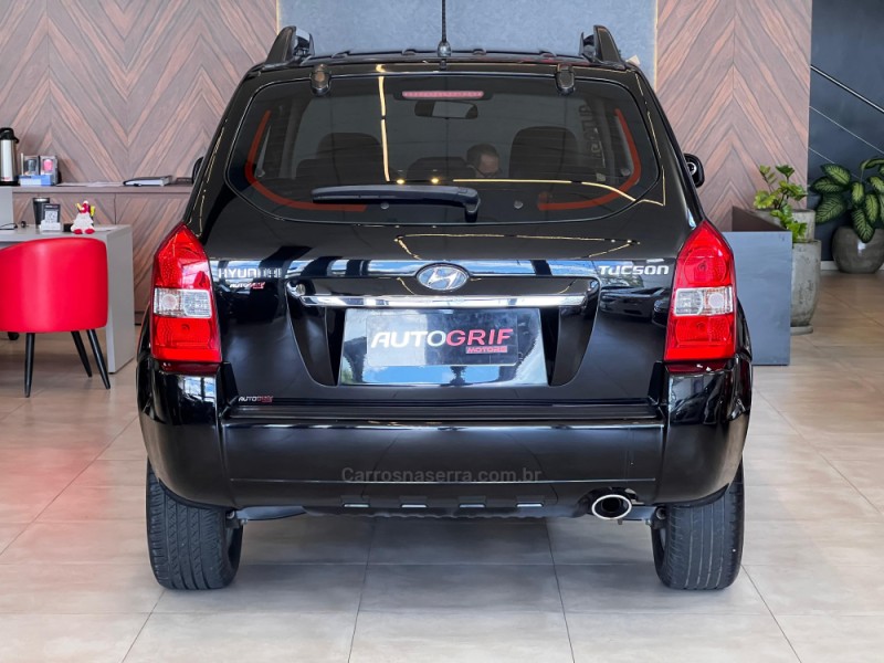 TUCSON 2.0 MPFI GLS 16V 143CV 2WD FLEX 4P AUTOMÁTICO - 2013 - CAMPO BOM