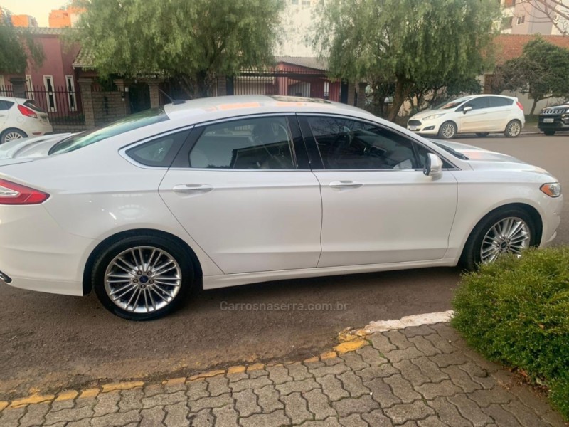 FUSION 2.0 TITANIUM AWD 16V GASOLINA 4P AUTOMÁTICO - 2016 - NOVA ARAçá