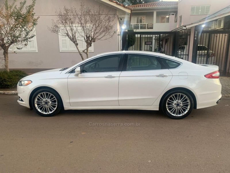 FUSION 2.0 TITANIUM AWD 16V GASOLINA 4P AUTOMÁTICO - 2016 - NOVA ARAçá