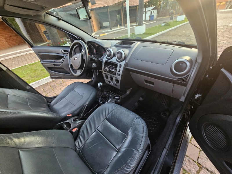 FIESTA 1.6 MPI TRAIL HATCH 8V FLEX 4P MANUAL - 2009 - VENâNCIO AIRES