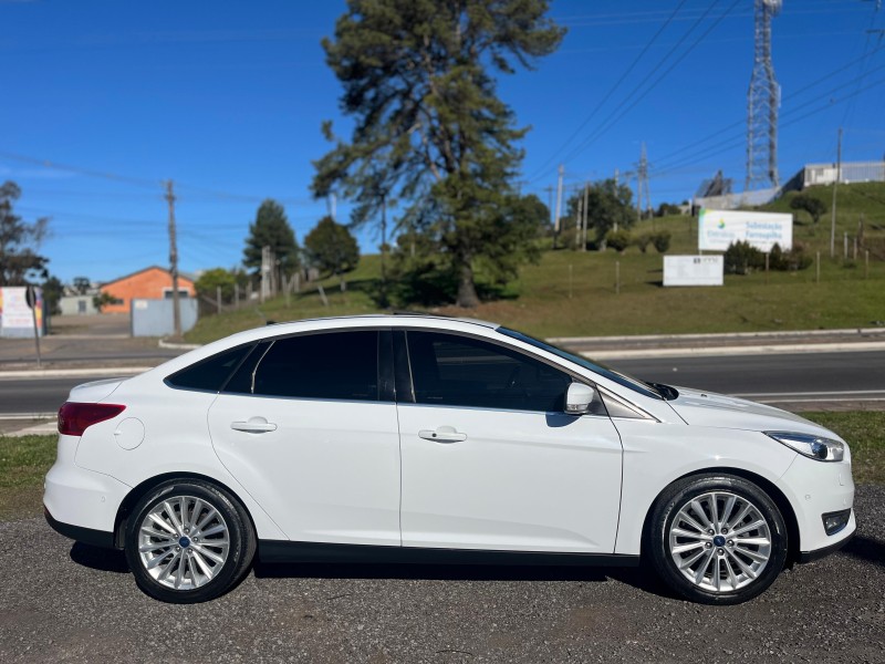 FOCUS 2.0 TITANIUM PLUS SEDAN 16V FLEX 4P AUTOMÁTICO