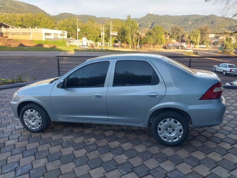 PRISMA 1.4 MPFI MAXX 8V FLEX 4P MANUAL - 2011 - ENCANTADO