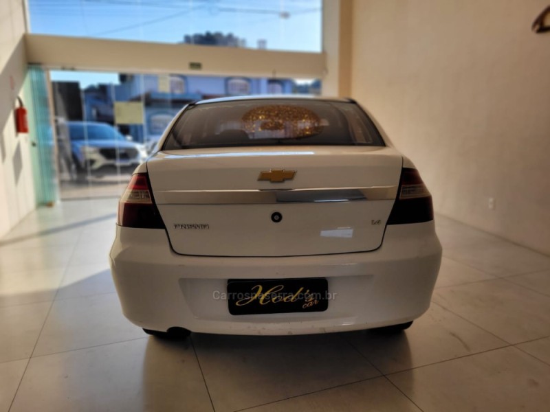 PRISMA 1.4 MPFI LT 8V FLEX 4P MANUAL - 2012 - CANELA
