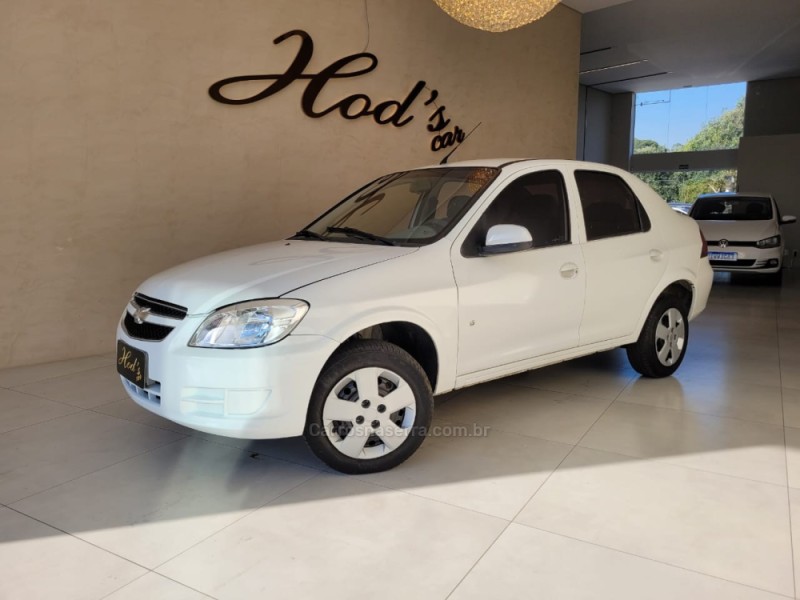 prisma 1.4 mpfi lt 8v flex 4p manual 2012 canela
