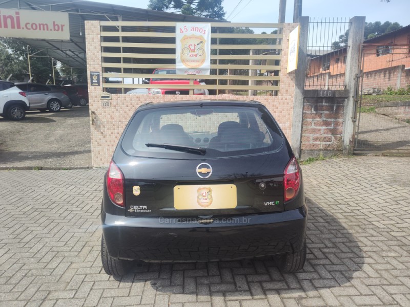 CELTA 1.0 MPFI SPIRIT 8V FLEX 4P MANUAL - 2010 - CANELA