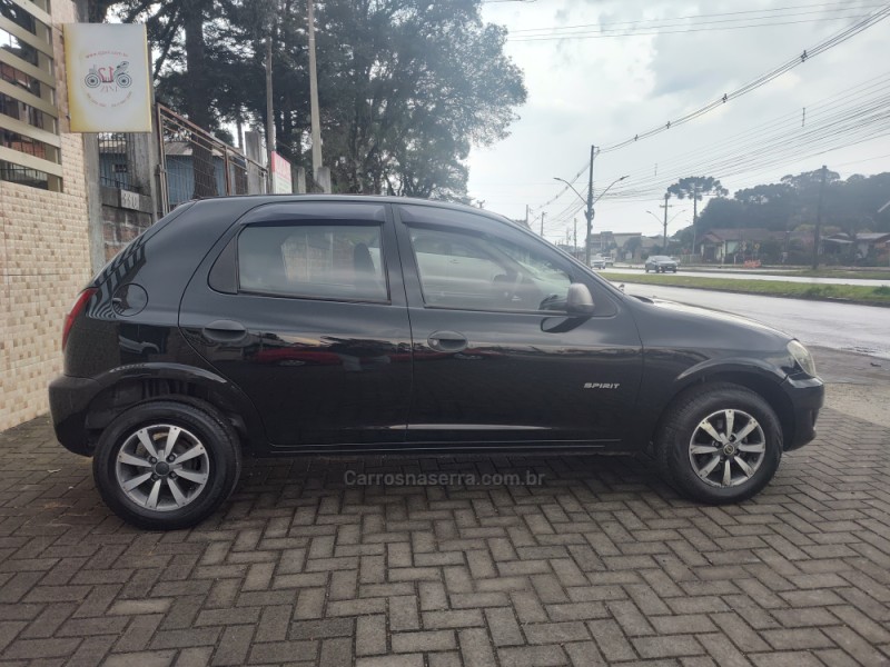 CELTA 1.0 MPFI SPIRIT 8V FLEX 4P MANUAL - 2010 - CANELA