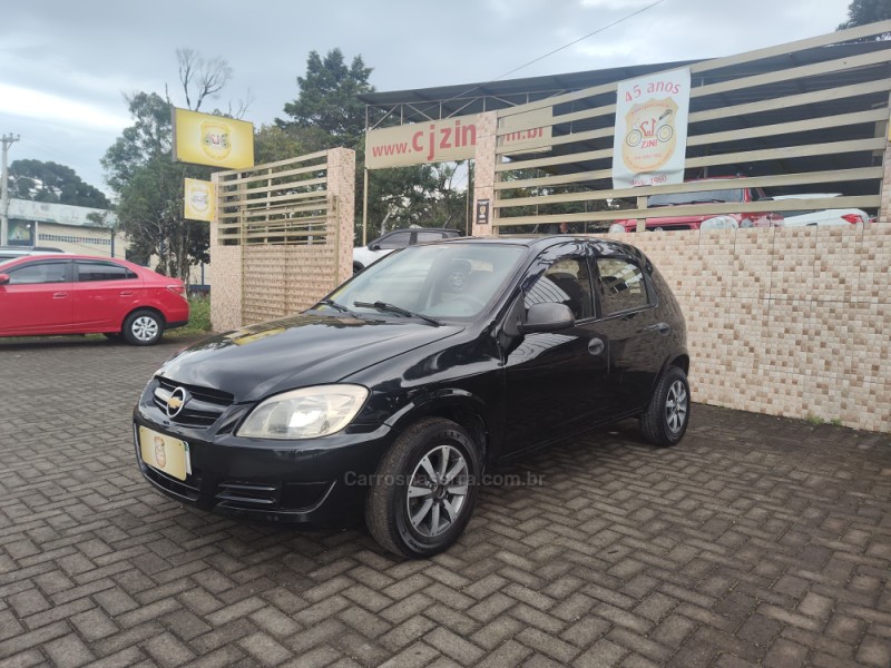 celta 1.0 mpfi spirit 8v flex 4p manual 2010 canela