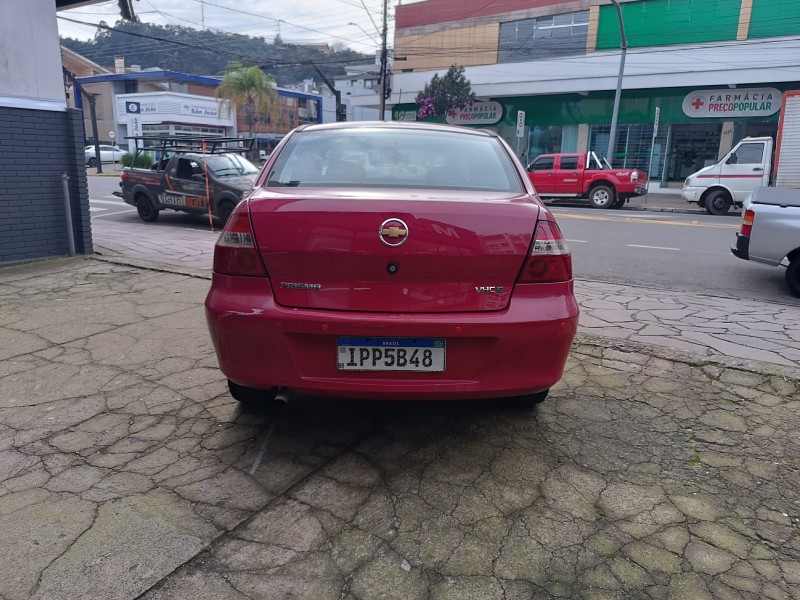 PRISMA 1.0 MPFI VHCE MAXX 8V FLEX 4P MANUAL - 2009 - FLORES DA CUNHA