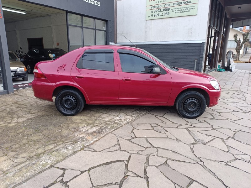 PRISMA 1.0 MPFI VHCE MAXX 8V FLEX 4P MANUAL - 2009 - FLORES DA CUNHA