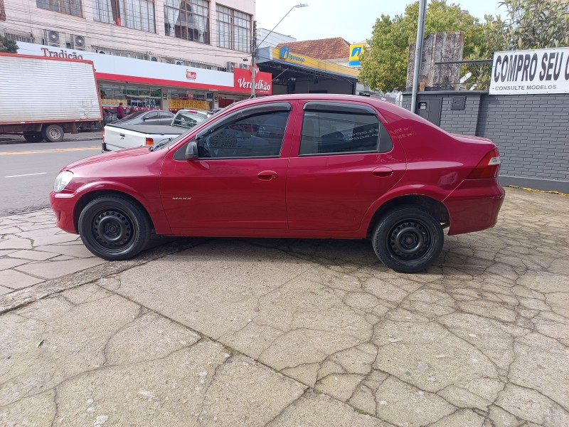 PRISMA 1.0 MPFI VHCE MAXX 8V FLEX 4P MANUAL - 2009 - FLORES DA CUNHA